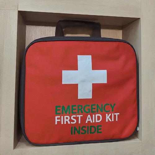 Emergency First Aid Kit Inside.