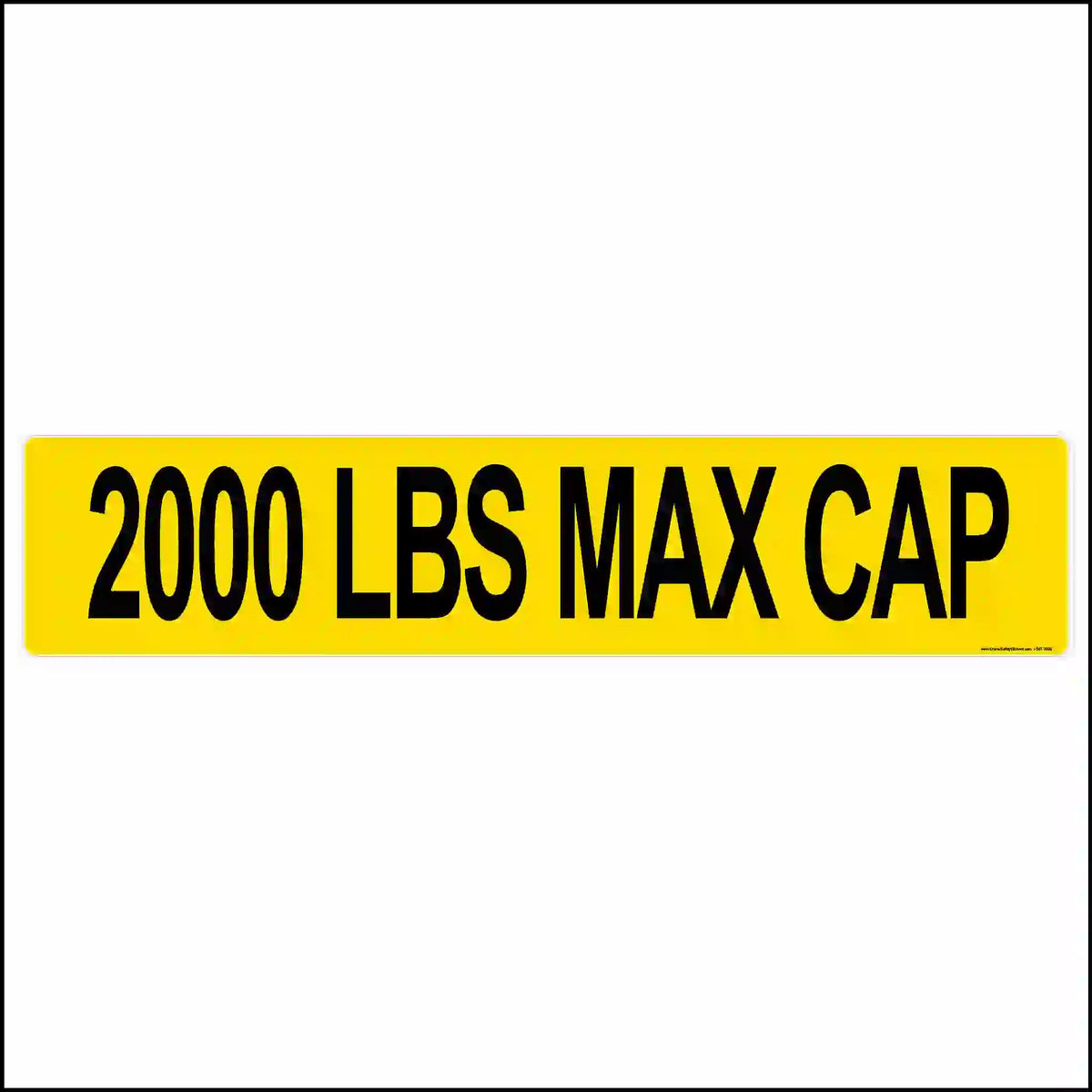 A rectangular yellow sign with the text "2000 LBS MAX CAP" in bold, black, capital letters.