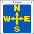 5 inch overhead crane directional decal printed with yellow north, south, east, and west arrows on a blue background.