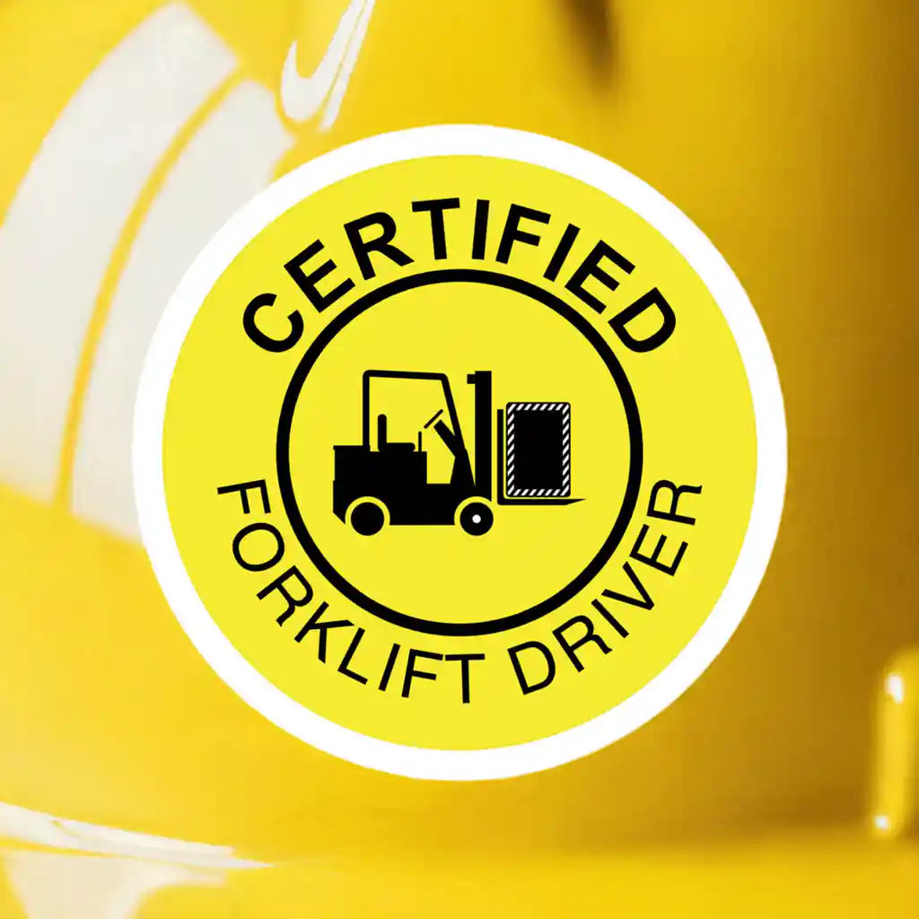 Certified forklift driver badge on a yellow hard hat.