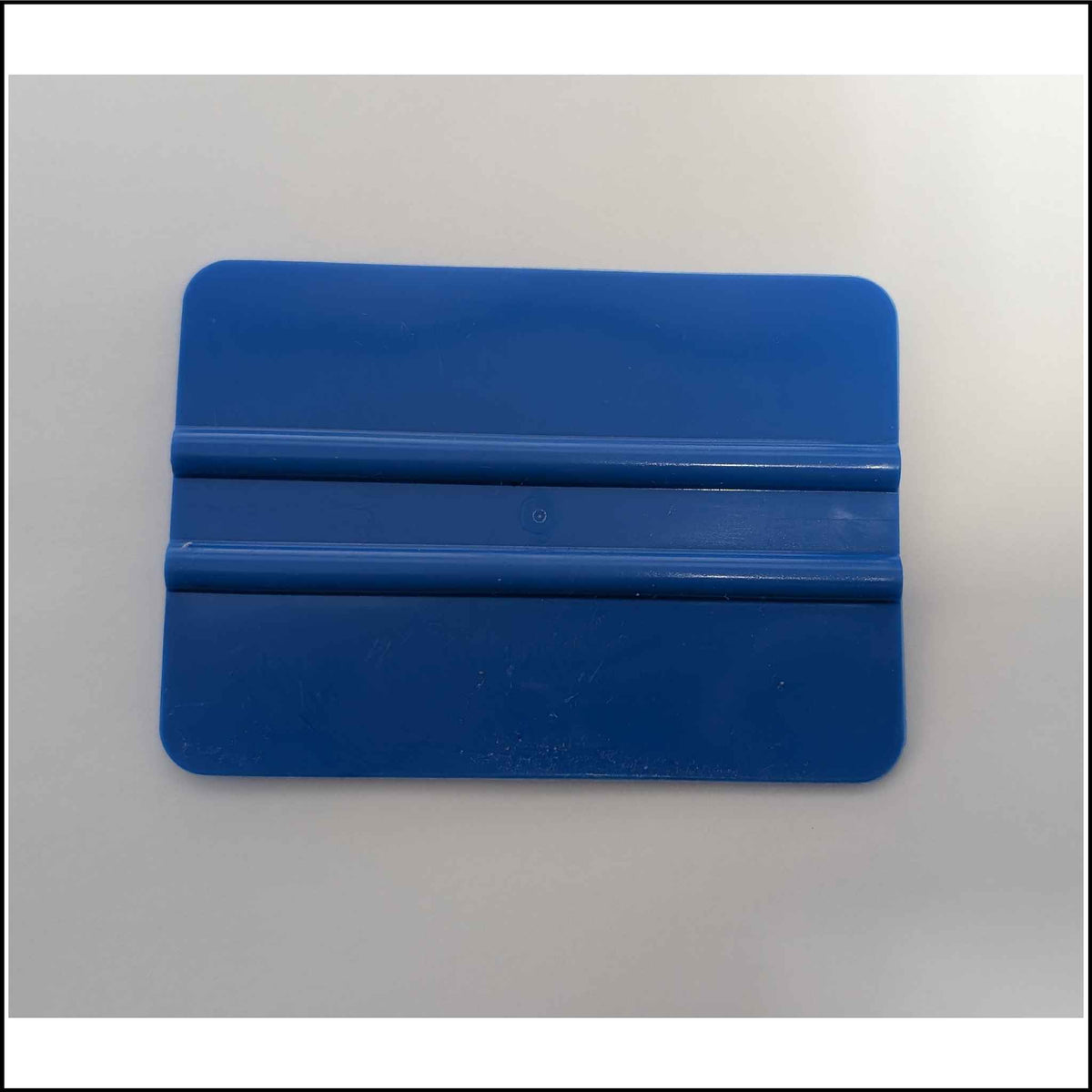 Blue Vinyl Installation squeegee.